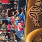 Abby and Aiden in their special limousine in the Movie World parade