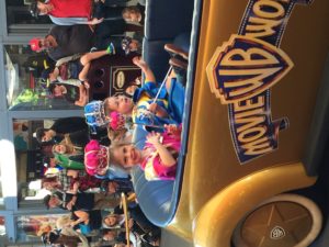 Abby and Aiden in their special limousine in the Movie World parade