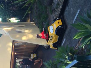 Abby driving a Taxi at Movie World