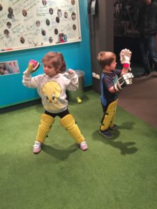 Abby and Aiden dressing up in Cricket gear at the Bradman Museum in Bowral