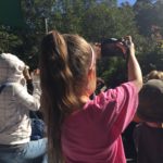 Abby taking photos at the Birds of Flight presentation