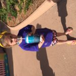 Abby drinking Lemonade from a big cup at Sea World