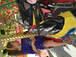 Abby on the Merry Go Round at Sea World