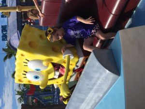 Abby and Spong Bob Square Pants in a Boat at Sea World.